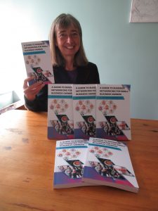 Sam with her book A Guide to Business Networking for Small Business Owners
